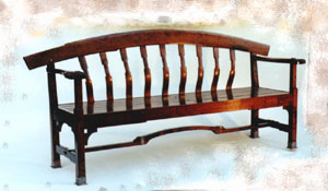 A cherry and copper entry hall bench